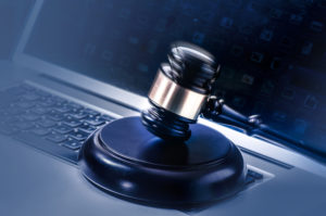 Sierra IP Law, PC - Patents, Trademarks & Copyrights Scholarship - Gavel on Laptop Computer